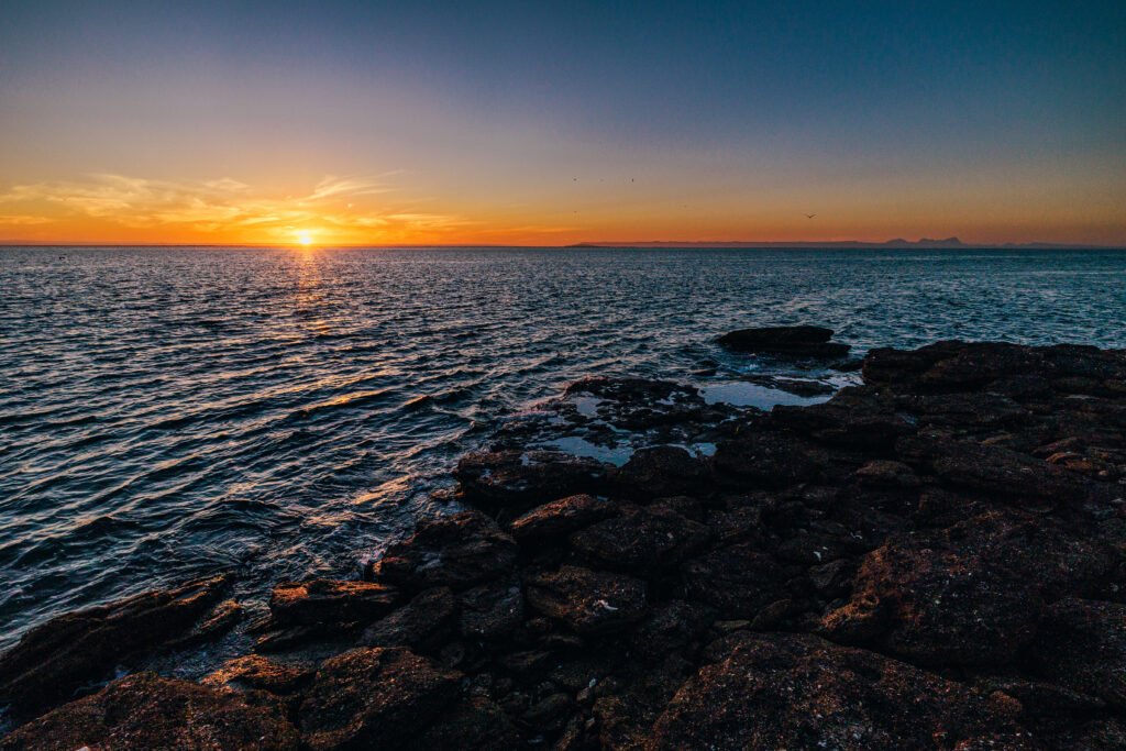 Rocky tidepools during sunset
